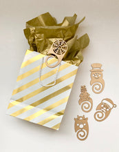 Load image into Gallery viewer, Christmas themed clip on gift tags with multiple uses. Snack closure, gift tag, bookmark