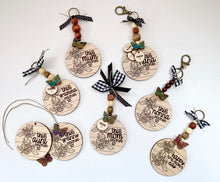 Load image into Gallery viewer, Mom key rings with kids names and an added butterfly as an option.