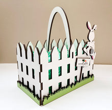 Load image into Gallery viewer, Easter basket laser cut file with cute bunny hopping the fence. Includes 2 size basket files