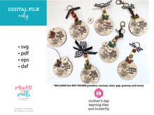 Load image into Gallery viewer, Mom key rings with kids names and an added butterfly as an option.